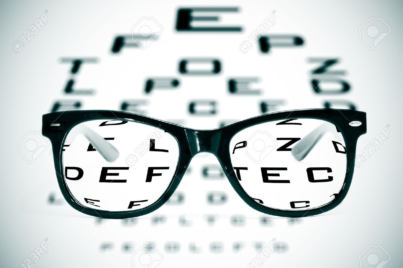 11325859 eyeglasses over a blurry eye chart Stock Photo glasses